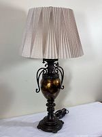 Full view of table lamp with shade