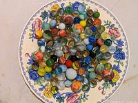 Plateful of assorted multicolor glass marbles