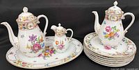 Full set showing both pots on platter, creamer, plates stack