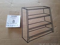 Box with printed illustration of the bookcase and dimensions note