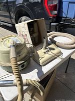 General Electric canister vacuum with hose, wand, floor head, box