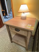 End table/nightstand with lamp on top, front angle