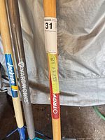 Close view of handles showing brand decals and D-grips