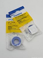Front view of both sealed PlumbShop thread seal tape packages