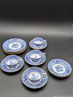Full set of Camilla teacups, saucers and plates laid out