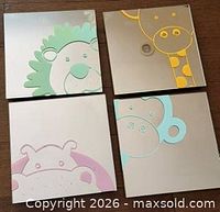 All four mirror tiles arranged; shows animal outlines