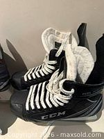 Side view CCM Pulse hockey skates showing size and laces