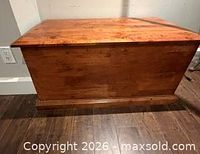 front view of wooden chest closed