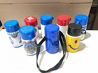 All eight insulated food containers grouped together
