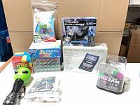 Group shot of all eight packaged items on table