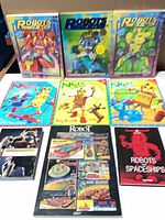 Group shot of all nine robot books laid out