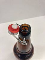 Close-up of bottle mouth with swing-top hardware and gasket