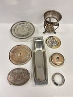 Top view of all silverplate items showing shapes and finishes