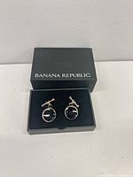 Cufflinks displayed in open Banana Republic box