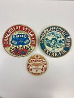 Front view showing all three cheese-label plates