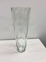 Full front view tall clear glass vase