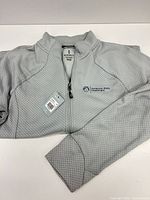 Front view of Elevate silver gray knit full-zip jacket