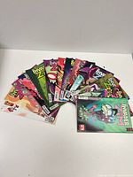All Invader Zim comic issues spread in a fan shape
