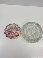 Both ashtrays side by side showing size and colour difference