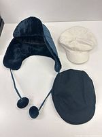 All three hats together top view