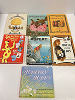 Front view of all seven books showing titles and cover art