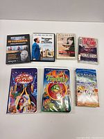 Front view of all seven media items showing titles and formats