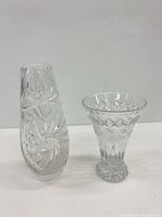 Front view showing both clear cut crystal vases