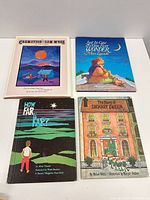 Front covers of all four hardcover children’s books