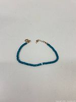 Bracelet laid flat showing beads and clasp