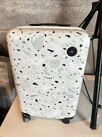 Front view showing terrazzo design and logo