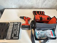 Overview of drill, socket set, bag, and bit pack