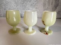 Three onyx goblets front view