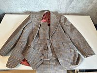 Full view of jacket, vest and trousers layout
