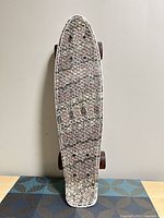 Full top view of 22-inch plastic mini cruiser skateboard showing deck design and overall condition