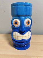 Front view showing full tiki face detail