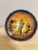 Top view showing full Kokopelli scene and coloration