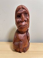 front view of carved wooden figure