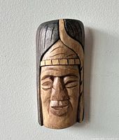 Front view of carved wood mask