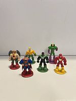 All six figures standing front view