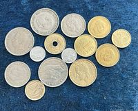 Top-down view of all coins on blue background
