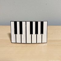 front view of piano key buckle