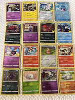 All sixteen Pokémon cards arranged in 4×4 grid