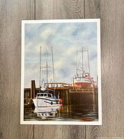 Full view of seascape print on wooden floor