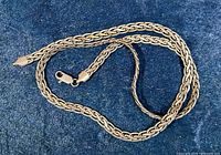 Full view of sterling silver Byzantine chain laid out