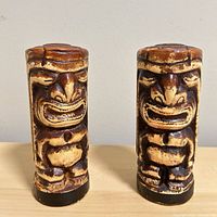 Front view of both tiki shakers