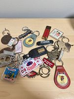Group shot of all 17 keychains spread on tabletop