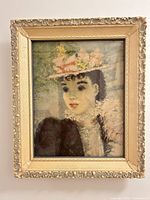 Front view of framed Monet print showing artwork and ornate frame detail