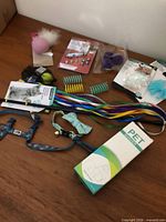 Overview of all cat accessories and toys on tabletop