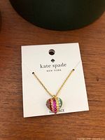 Front view of necklace on retail card