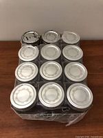 Top view of shrink-wrapped 12-jar pack